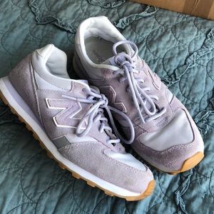 Lilac new balance sneakers.